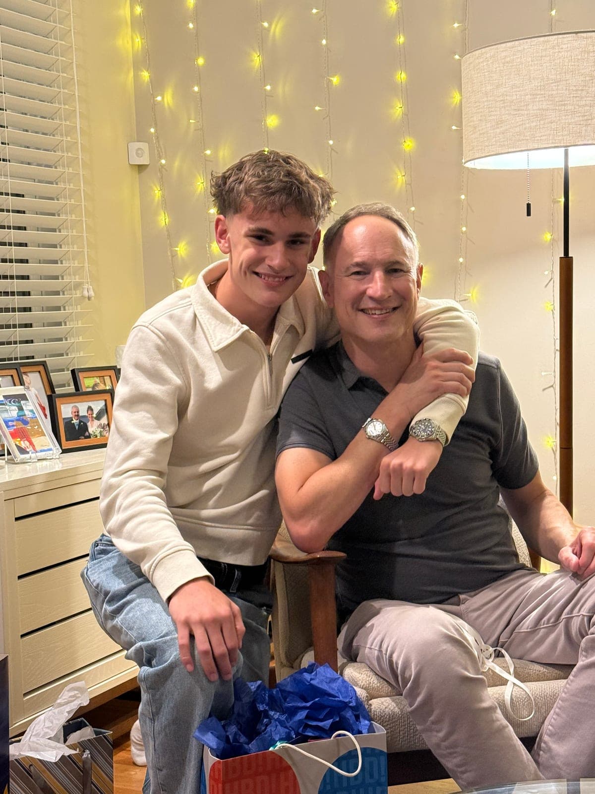 Matias and his father at the birthday, the father wearing the finished watch